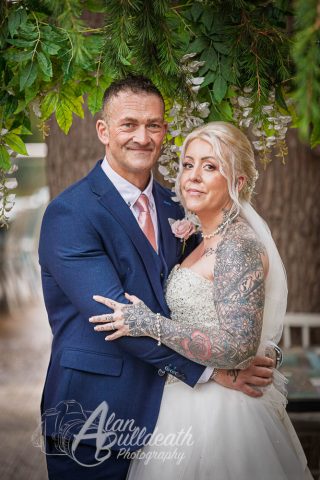 Posed photo of bride and groom at The Oaklands Hotel Norwich