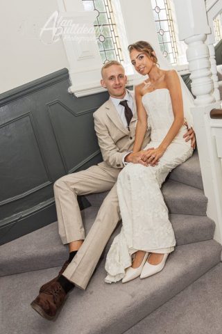 Bride and Groom still on stairs at George Hotel Norwich