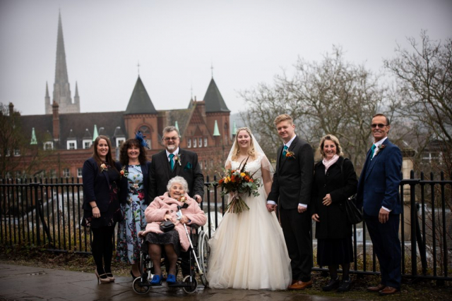 Bride Groom and Family with Norwich Cathedral in background at Norwich Castle