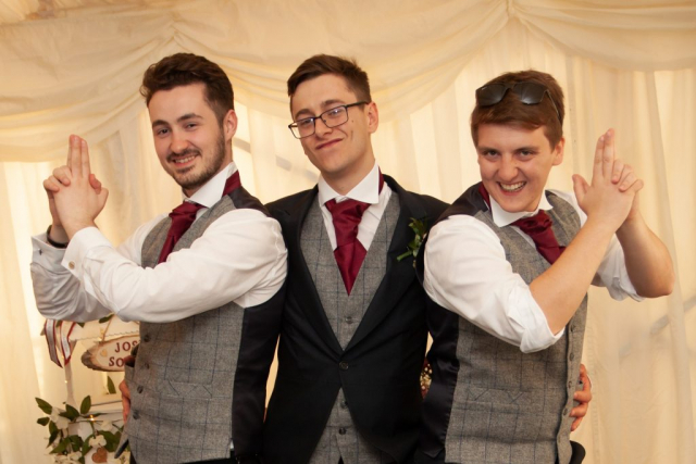 Groom and Best Men posing at venue in Norfolk