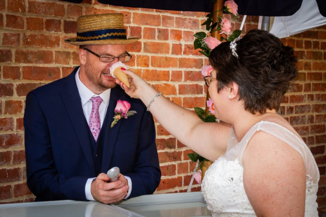Bride pushing ice cream in to grooms nose at The Reading Rooms Alby