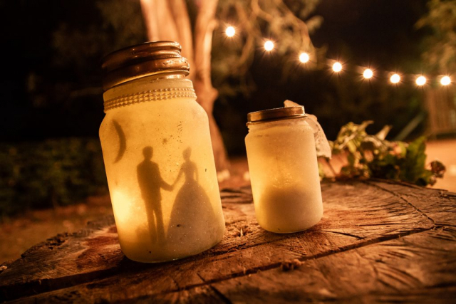 Candle lit bride and groom jar at Norwich