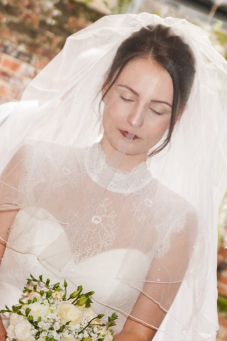 Bride waiting to enter wedding ceremony at Harleston Norfolk