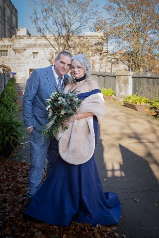 Bride and Groom on the bridge at the Castle registry office Norwich