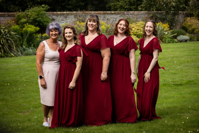 Bridesmaid and mother of the bride on the grass at Knights Hotel Kings Lynn PE30 3HQ