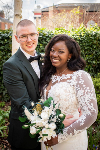 Bride and Groom in loving embrace at venue in Norwich